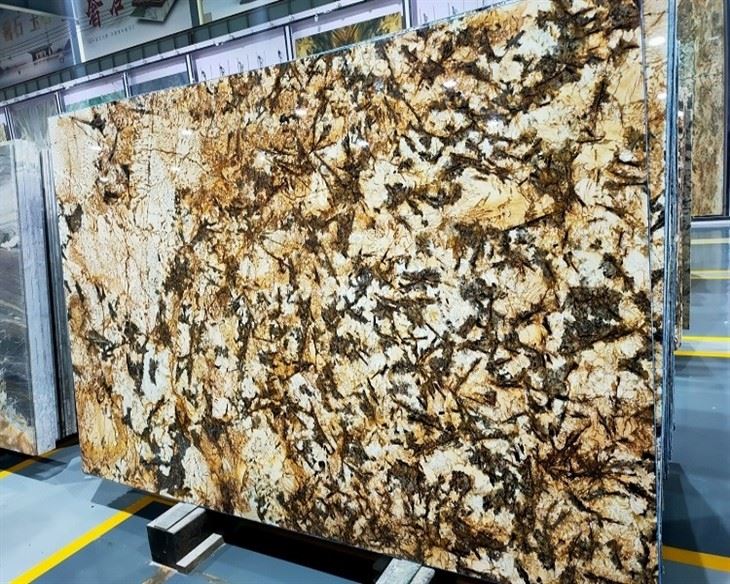 Delicatus Brown Granite polished slabs 
